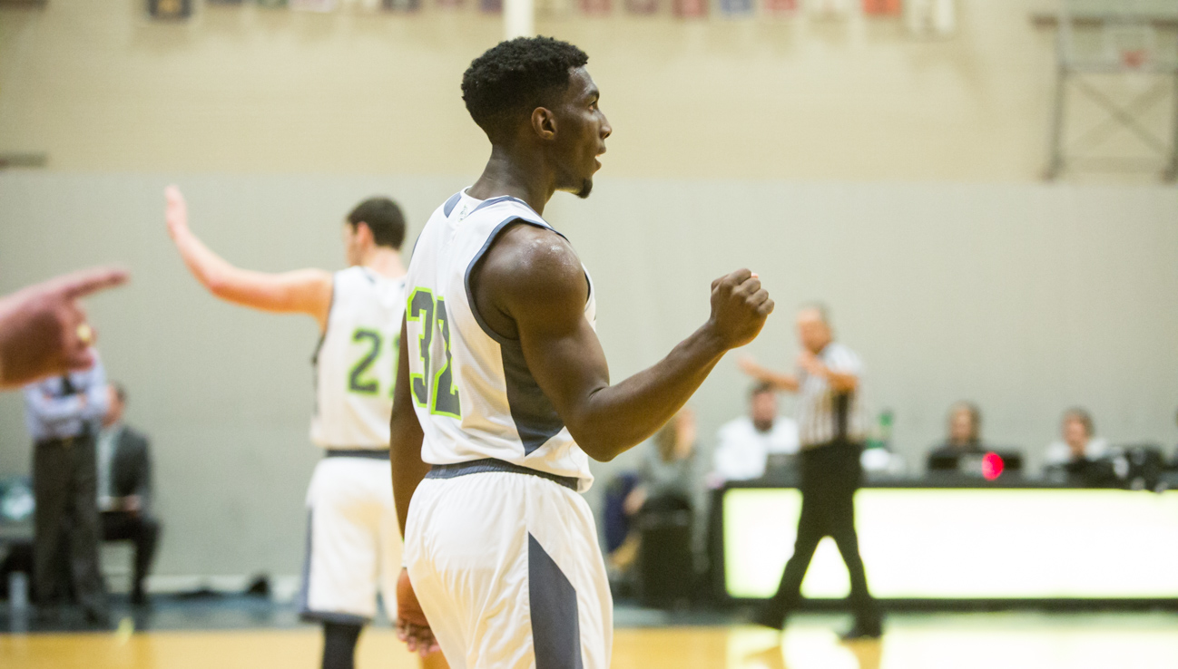 Men's Basketball Races Past Mustangs for First Win